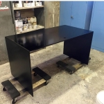 Custom Blackened Stainless Steel Waterfall Desk w/ Grommet Hole