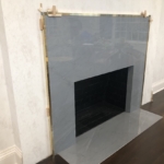 Custom Polished Lacquer Brass Step Fireplace Frame