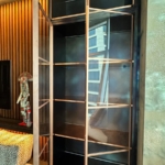 Custom copper and glass doors with unique integrated hardware style. Copper metal inlays and frames also all By Rbl Metals Design Credit Drew Mcgukin WoodWork for this project New Day Woodwork