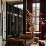 Custom bronze ceiling hung decorative swing with detailed upholstery. Finish lite antique bronze. Satin lacquer. All hand made. And installed By RBL METALS