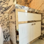 Custom polished stainless steel. Marble and lacquer bathroom vanities. By RBL Metals. Made in NY & PA