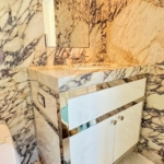 Custom polished stainless steel. Marble and lacquer bathroom vanities. By RBL Metals. Made in NY & PA