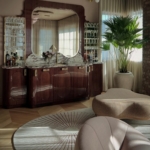 Custom mahogany bar with stone and mirror. Polished brass By Rbl Metals