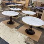 Custom restaurant tables. Brass details By Rbl Metals - Edges with rivets - Middle inlay and base edge - All Hand Made