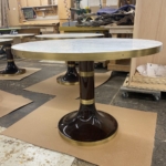 Custom restaurant tables. Brass details By Rbl Metals - Edges with rivets - Middle inlay and base edge - All Hand Made