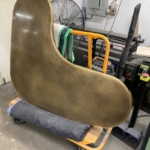 Custom antique brass kidney shaped kitchen island for a FL project