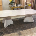 Here. RBL Metals made the hammered metal edge for this resin and lacquer dining room table. Woodwork. New. Day. Woodwork