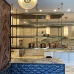 Custom antique brass with rivets and walnut bistro shelves - Ceiling hung By Rbl too. Hand made. Here in Ny & Pa
