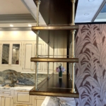 Custom antique brass with rivets and walnut bistro shelves - Ceiling hung By Rbl too. Hand made. Here in Ny & Pa