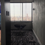 Custom polished stainless steel and ceiling hung bench - Triangle Shaped - all hand made and install By Rbl Metals
